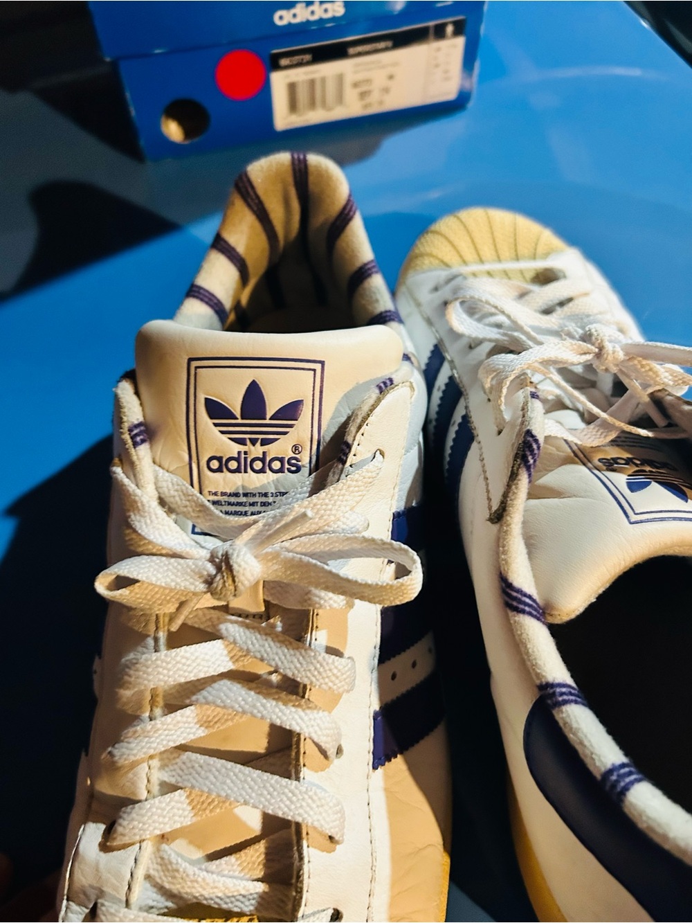 adidas Superstar Sneakers in White and Navy
